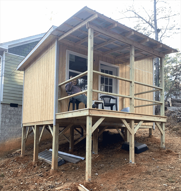 Wide porch completed on the Midnight Falcon art studio, ready to be used as an extended workspace.