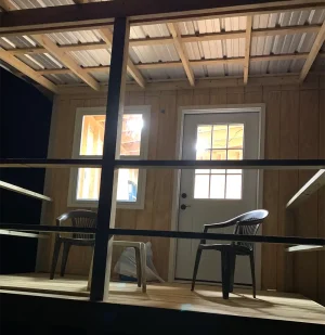 Sunlit interior of the Midnight Falcon art studio with completed electrical lighting.