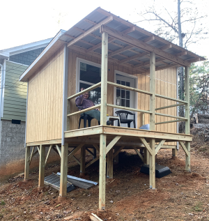 Wide porch completed on the Midnight Falcon art studio, ready to be used as an extended workspace.